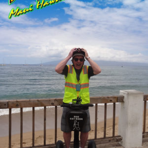 Man on segway Lahaina beach lanai background